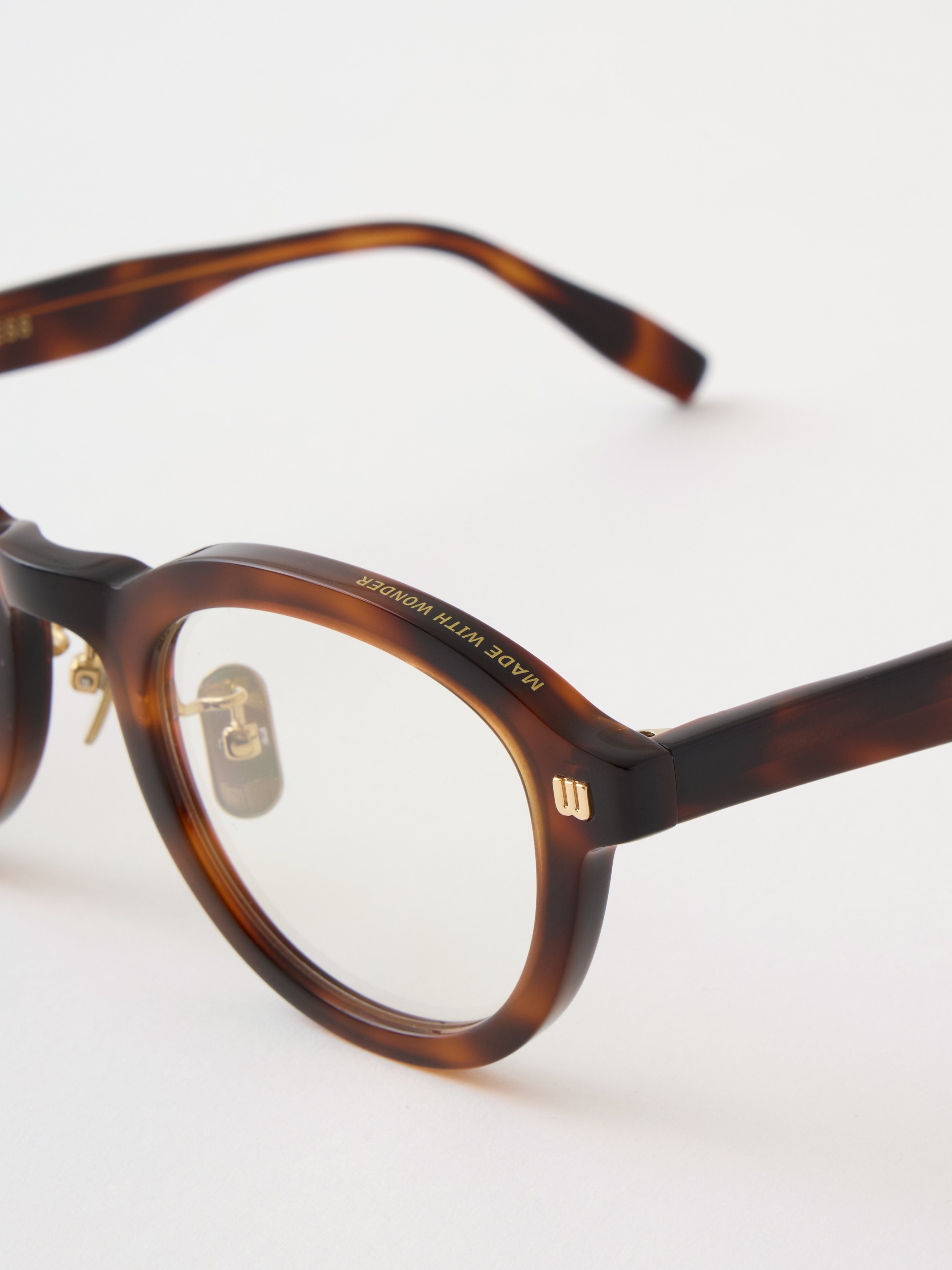 M.W.W GLASSES